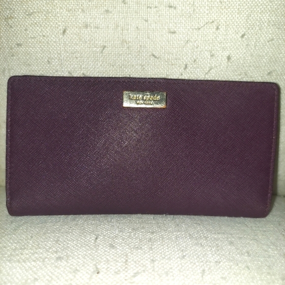 kate spade Handbags - Kate Spade Plumb Saffiano Leather Slim Wallet